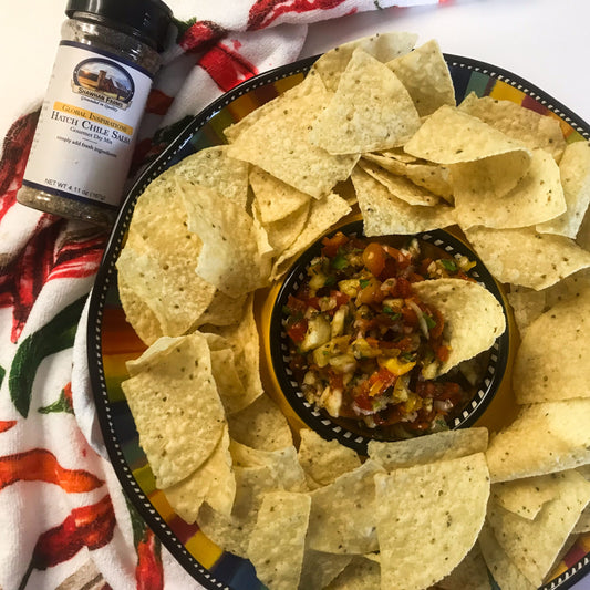 Bowl of Hatch Chile and Pineapple Salsa made with fresh pineapple, tomatoes, jalapeños, onions, herbs, and Shawhan Farms Hatch Chile Salsa Starter. Photo courtesy of My Curated Tastes