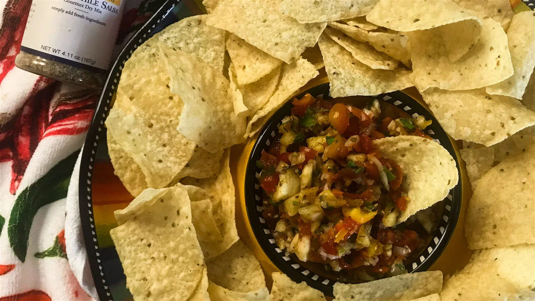 Hatch Chile Salsa with tortilla chips on a chip platter