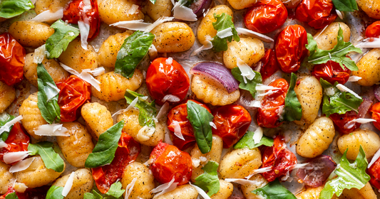Gnocchi, tomato, red onion & herbs on a sheetpan