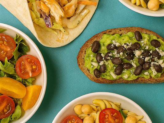 Colorful summer dinner ideas featuring pasta salad, toast, antipasto, and rotisserie wraps