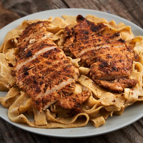 Creamy noodles with chicken cutlets on top 